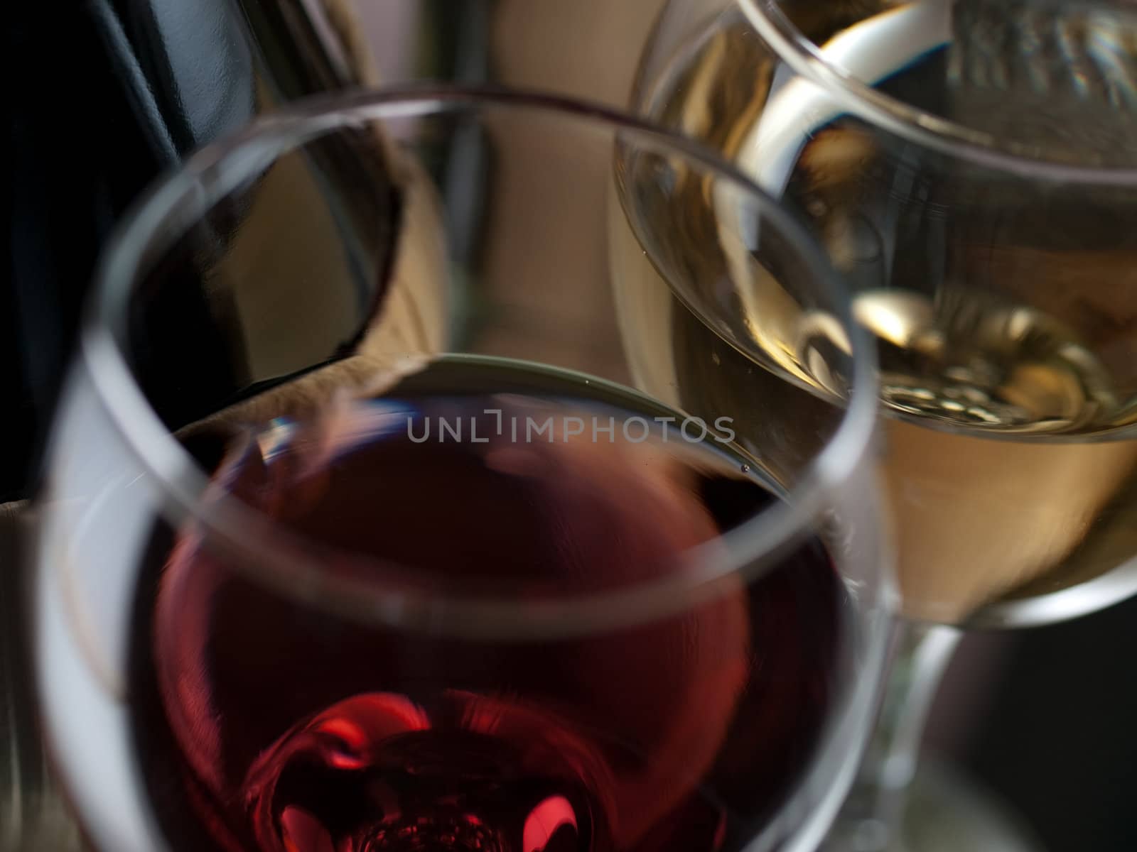 Red and white wine in elegant setting