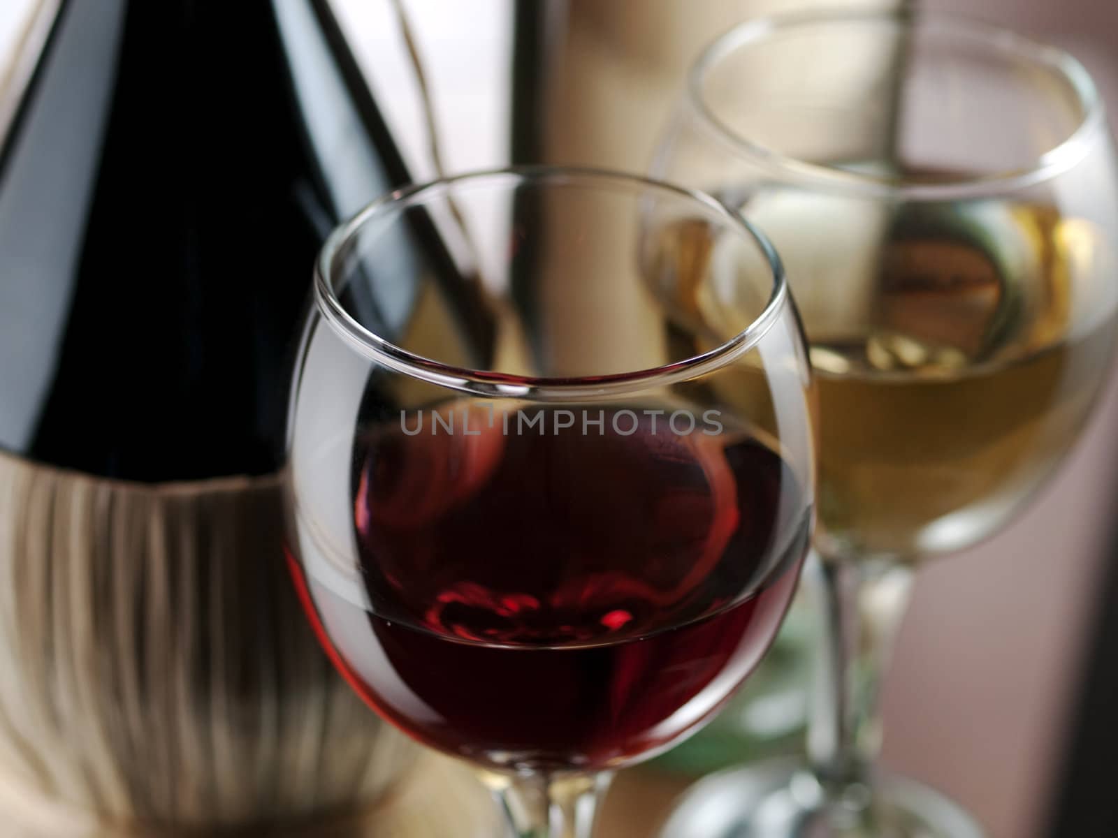 Red and white wine in elegant setting