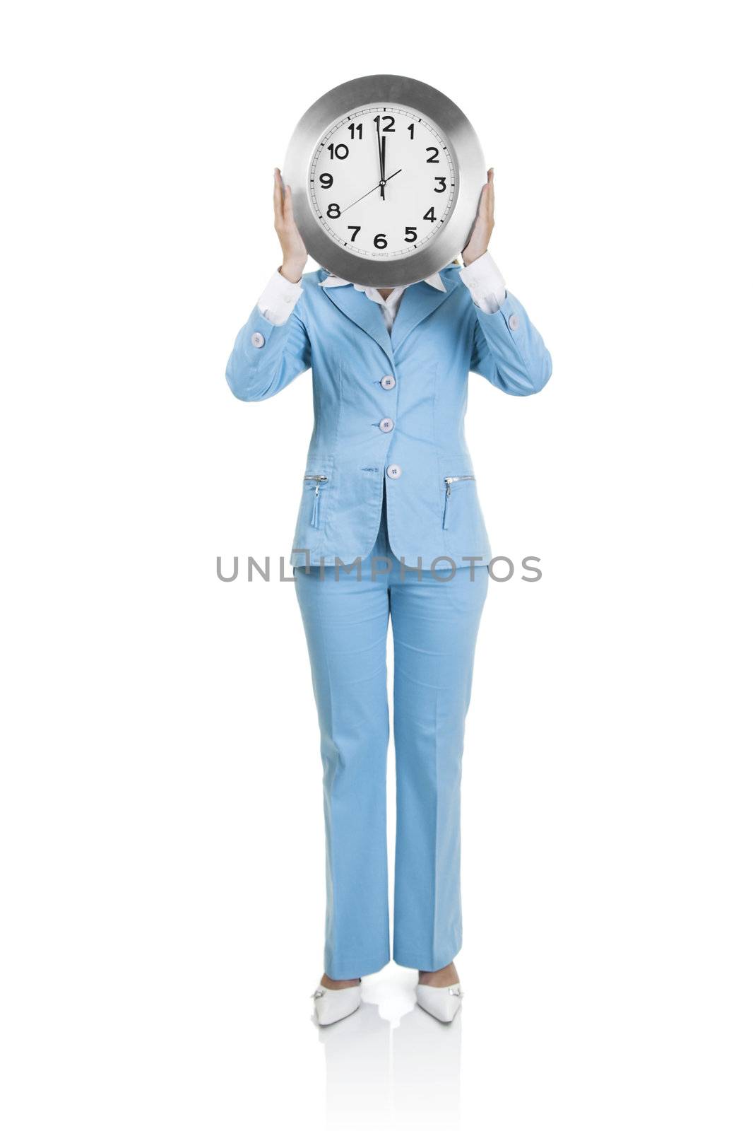 Business active woman standing over a white background with a clock on the face