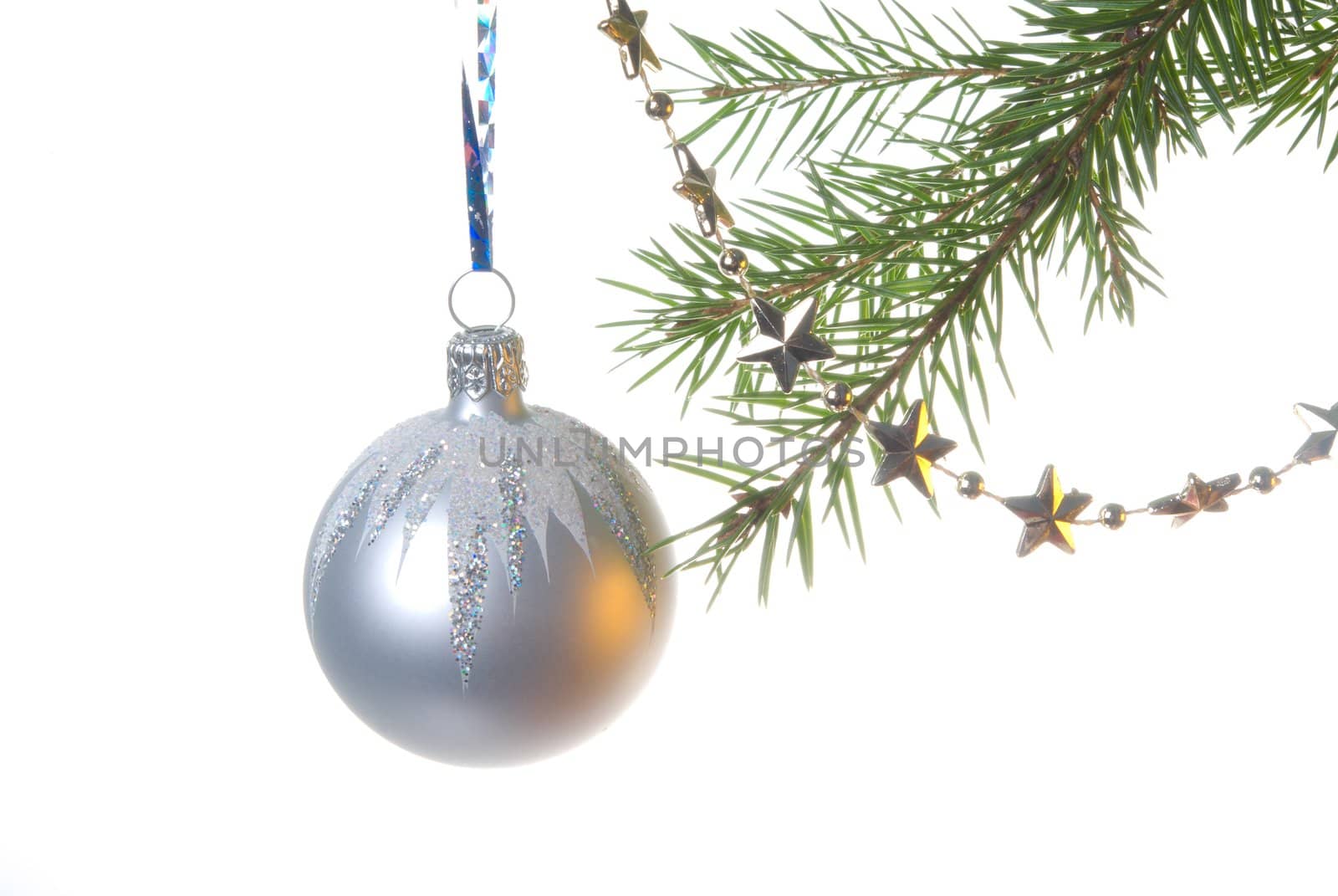 bright embellishment of the fir tree on cristmas,silver toy on white background