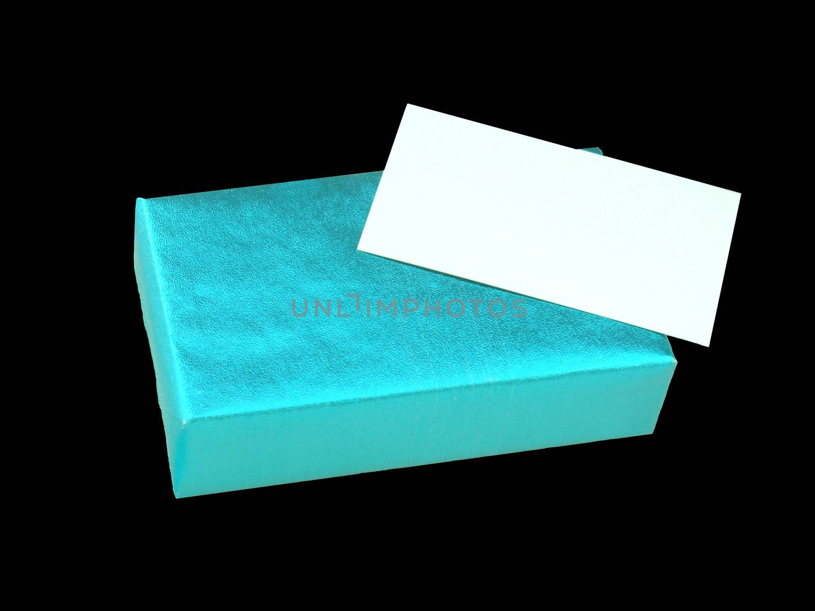 Blue shiny gift box with plain tag on isolated black background