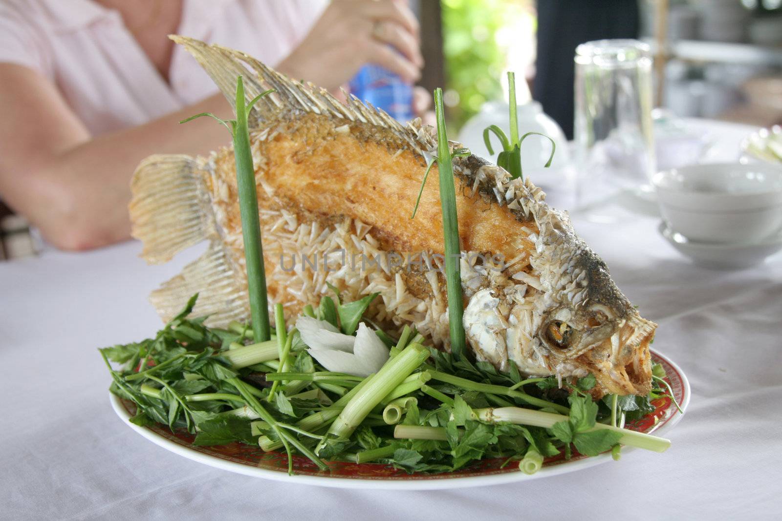 Freshly prepared fish served at the table