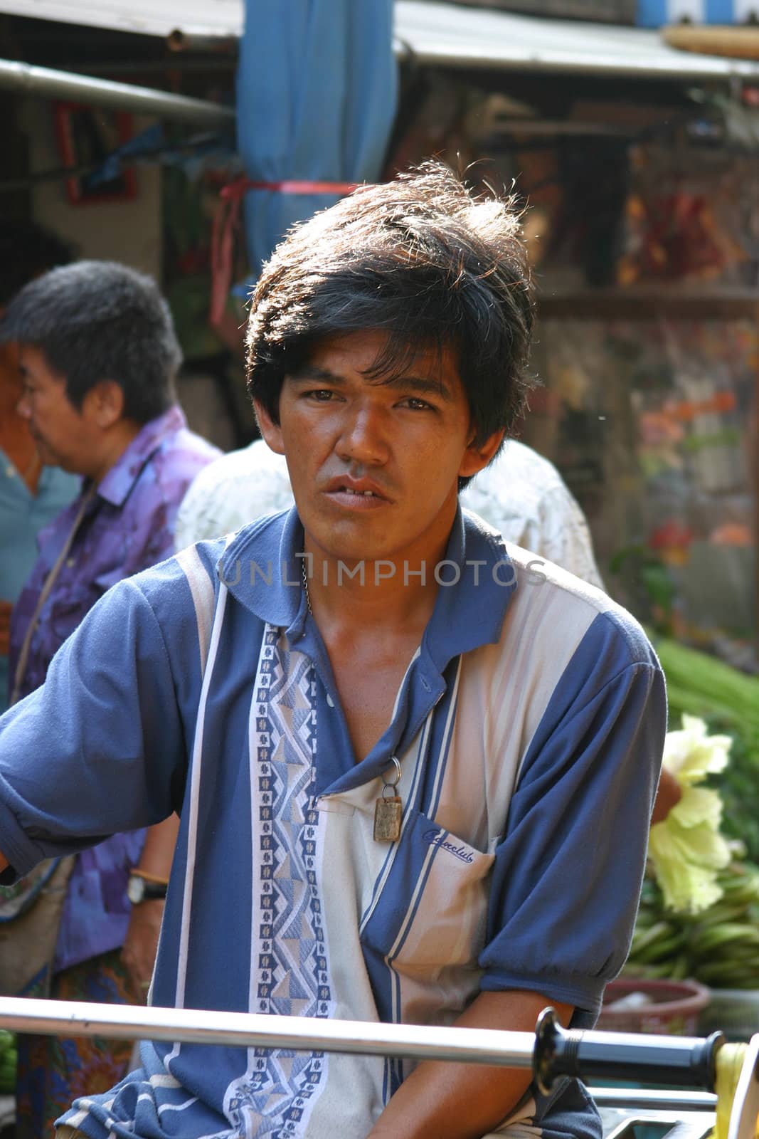 Man at a market in Bangkok, thailand