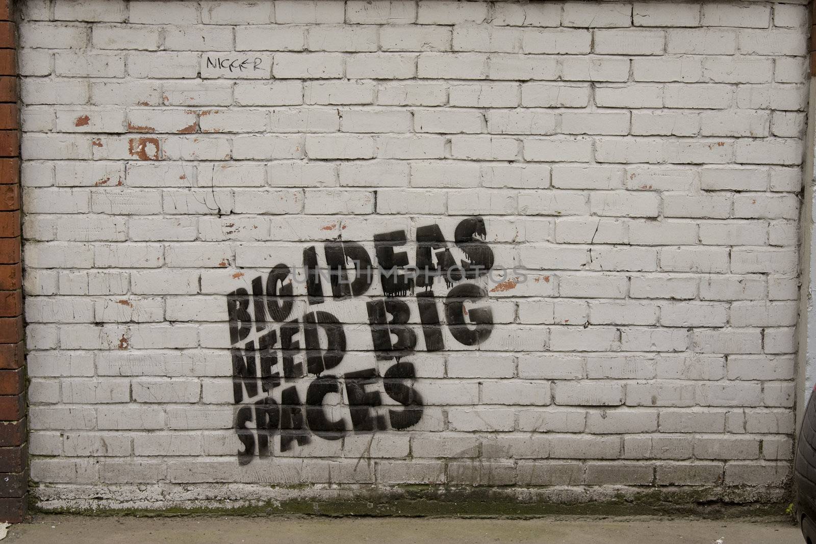 'Big ideas need big spaces' graffiti on a wall