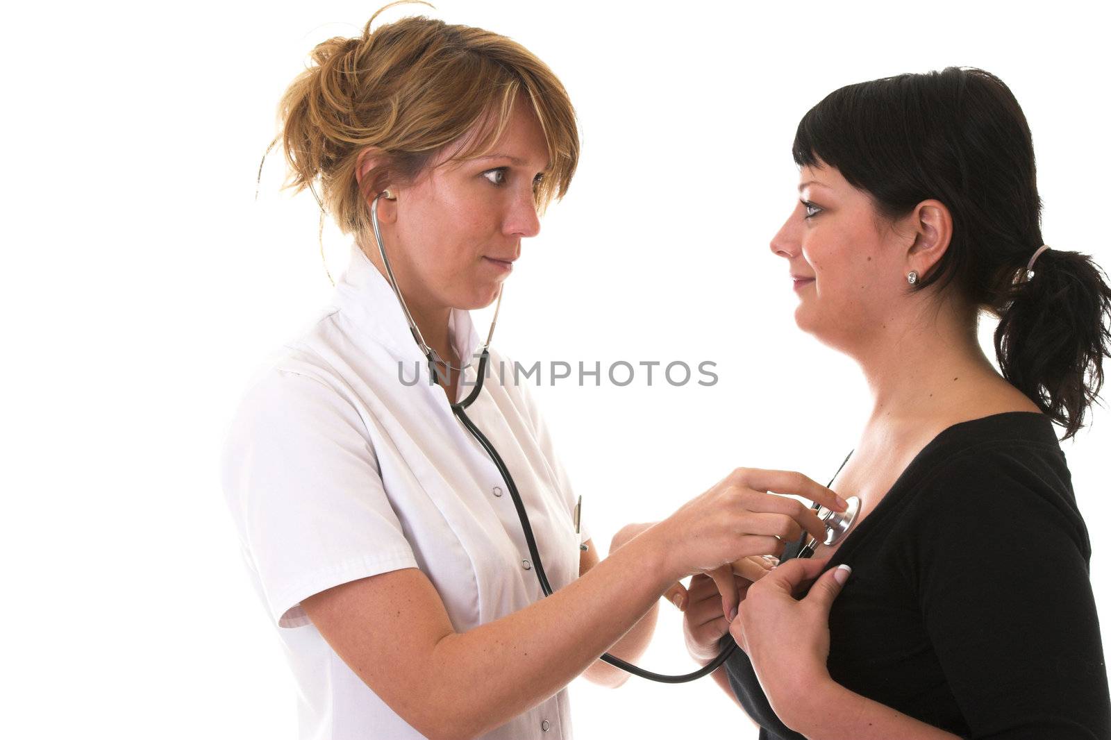 Nurse listening to her patients lungs