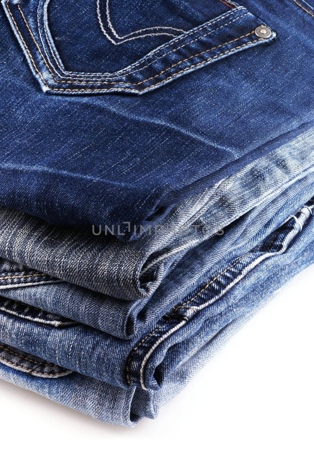 Stack of jeans. by SasPartout