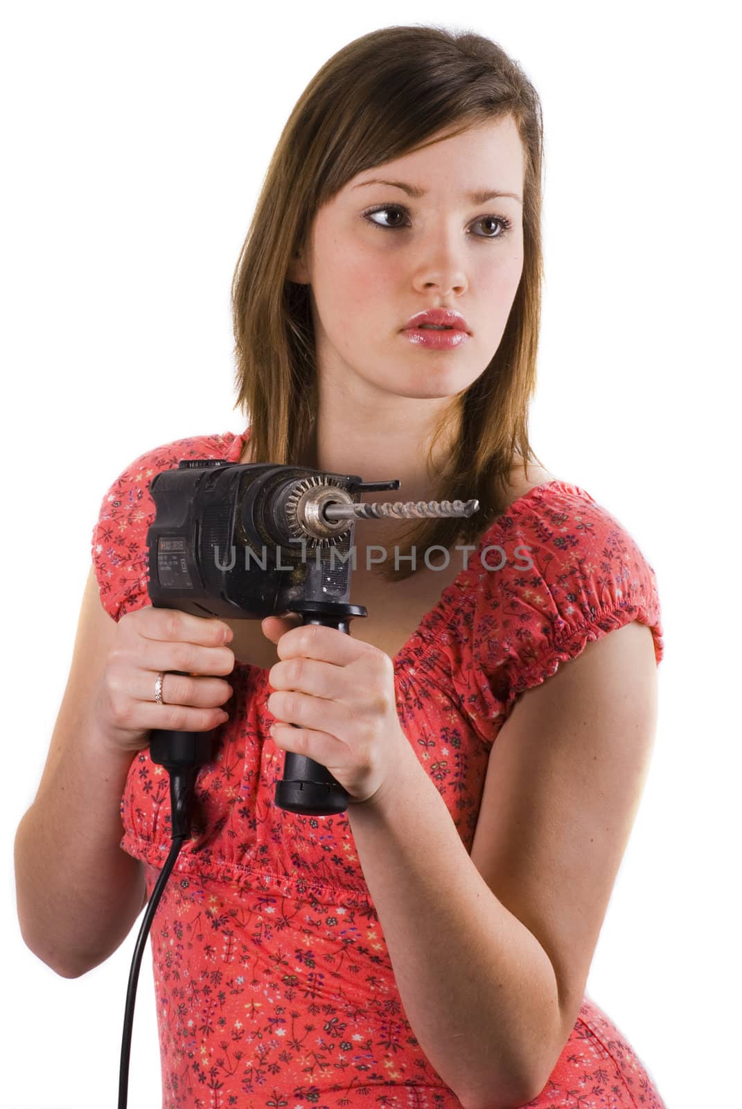 DIY girl, ready to handle a hammer drill; isolated on white.