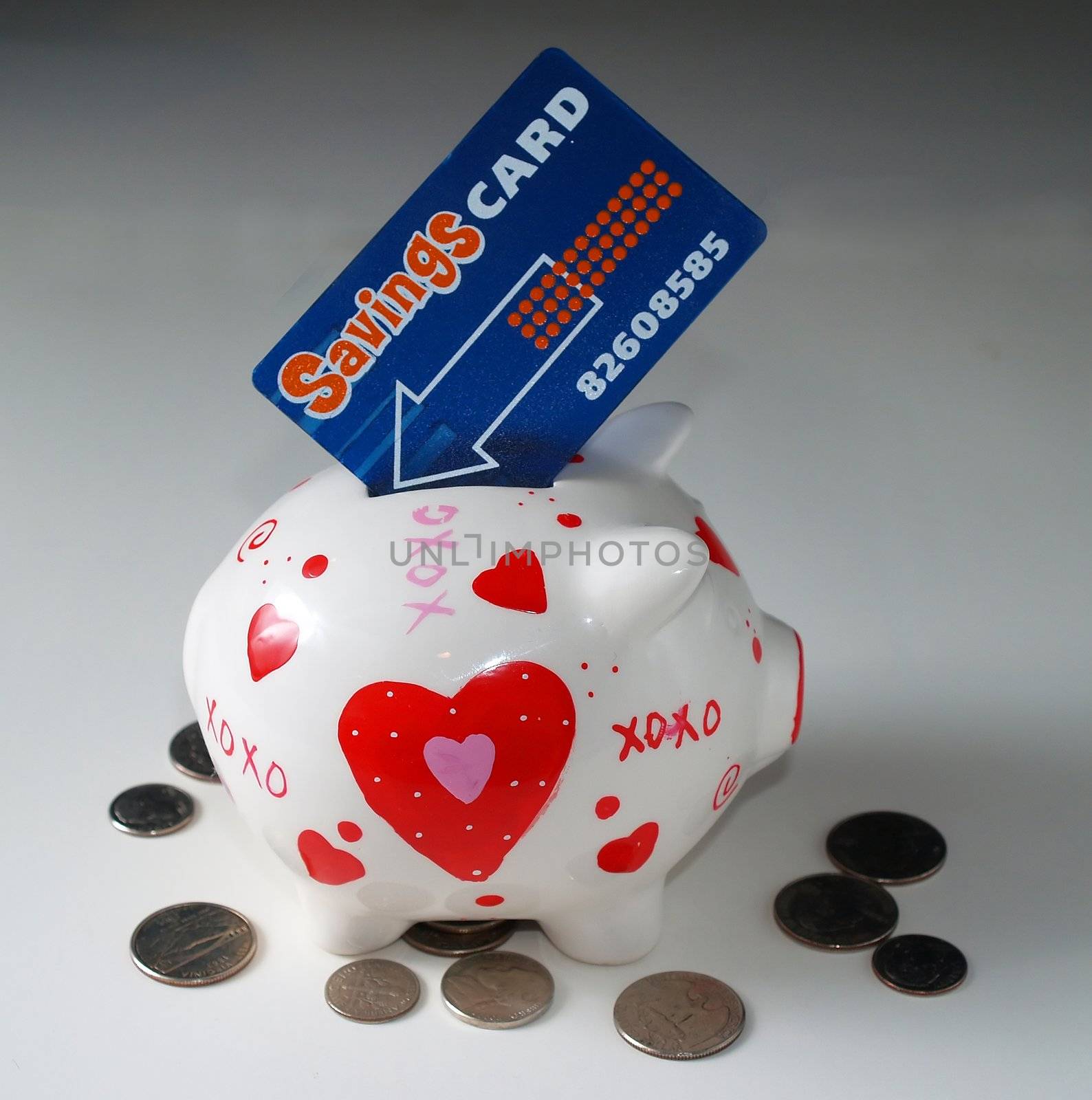 piggy bank and  saving card on the white background