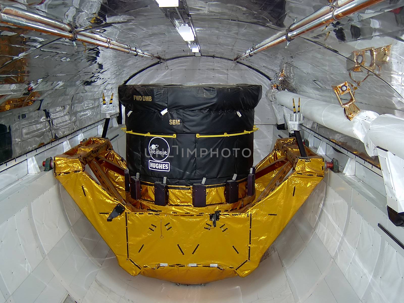 A photograph of the robotic arm inside the cargo bay of a 
NASA Space Shuttle.