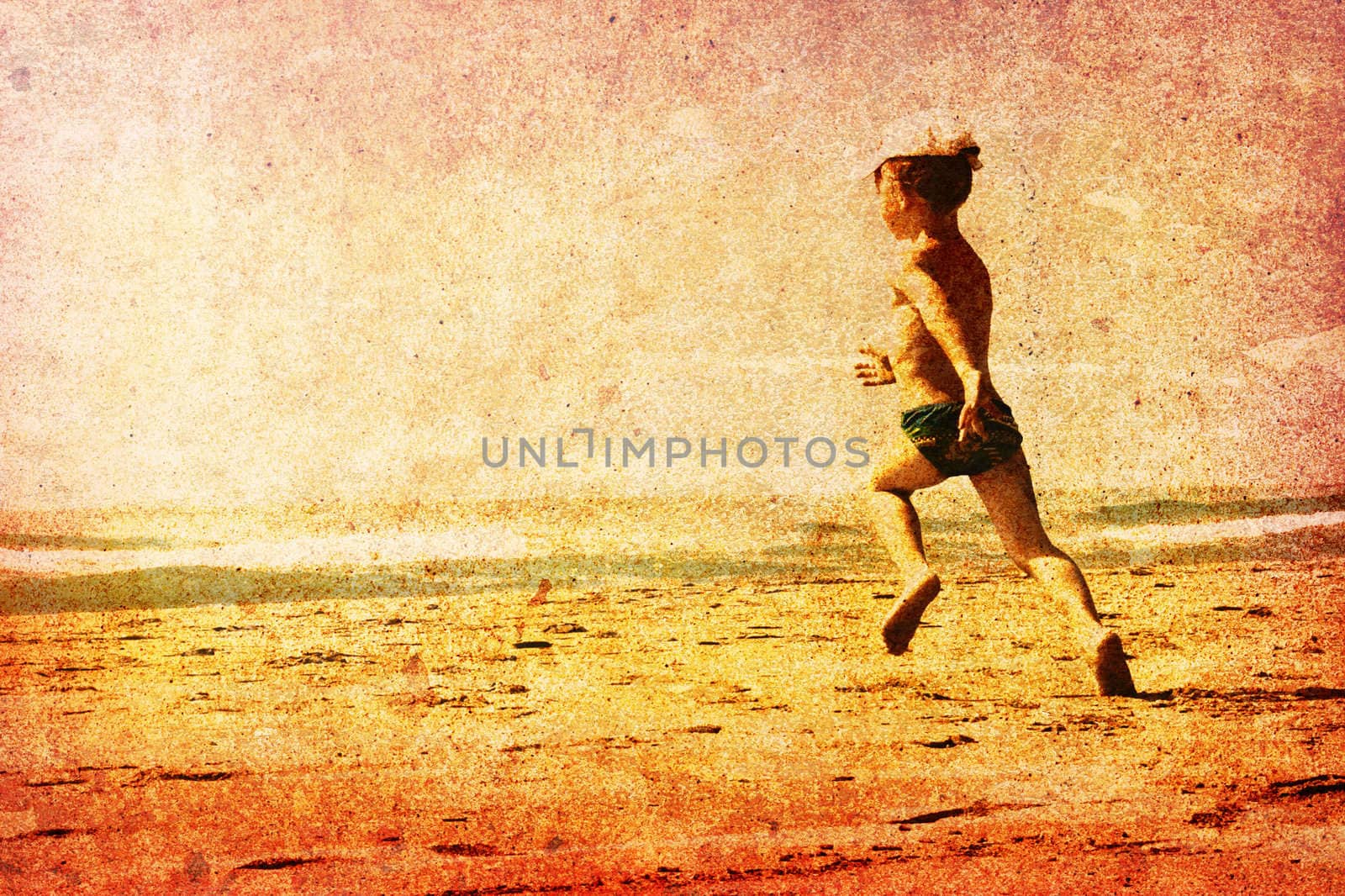 Child running on a beach by chrisroll