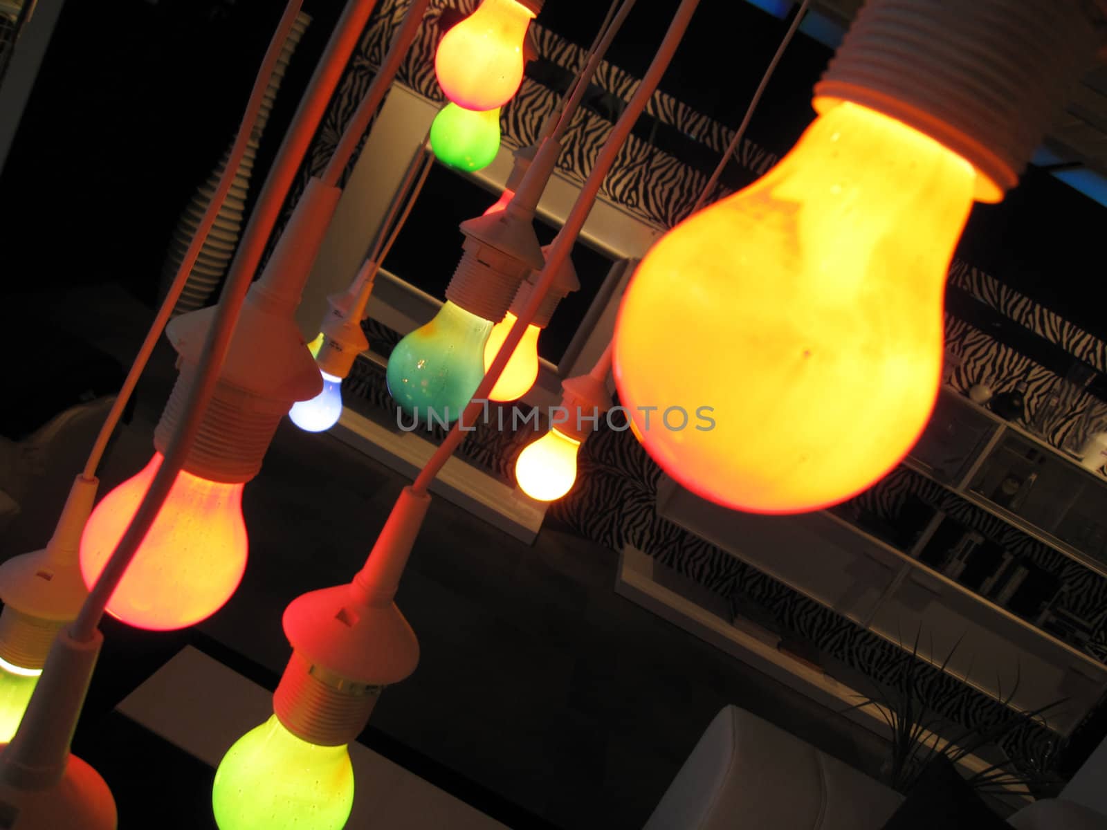 many modern colored lights with white sockets