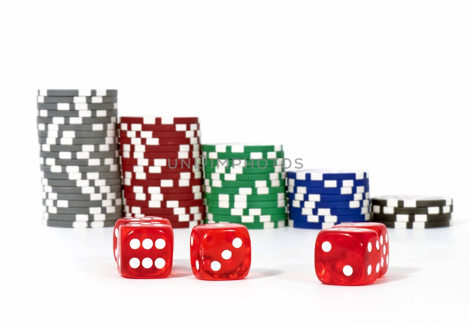 Piled poker chips with dice by rigamondis