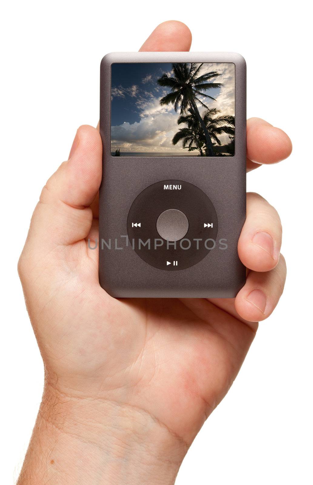 Man's Hand Holding Electronic Gadget with Tropical Scene on Screen Isolated on a White Background.