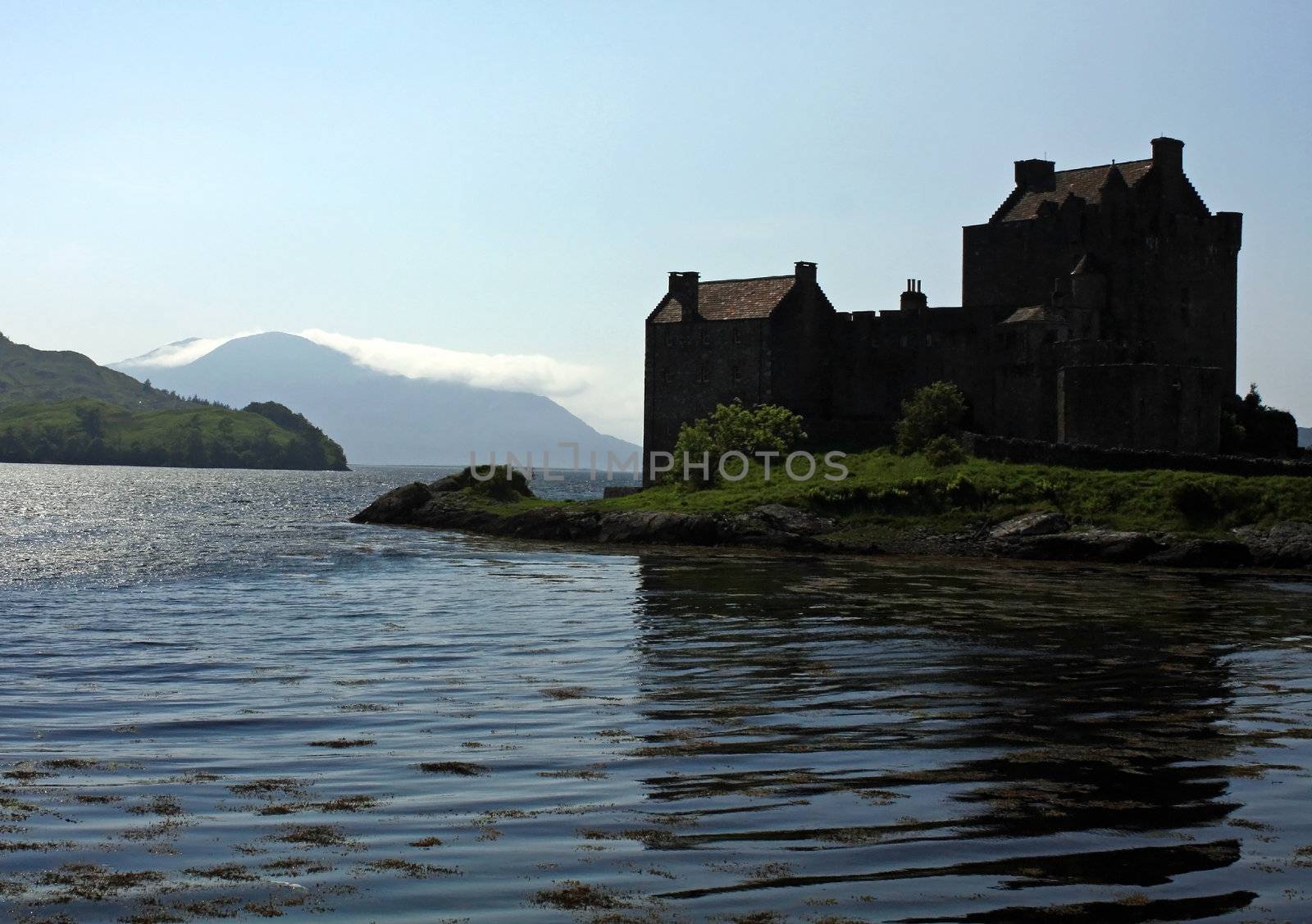 A view of Scotland's Eilean Donan Castle on an island in the loch.
