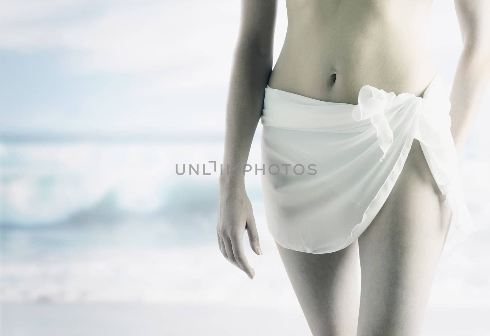 Girl Walking on Beach Wearing Sarong