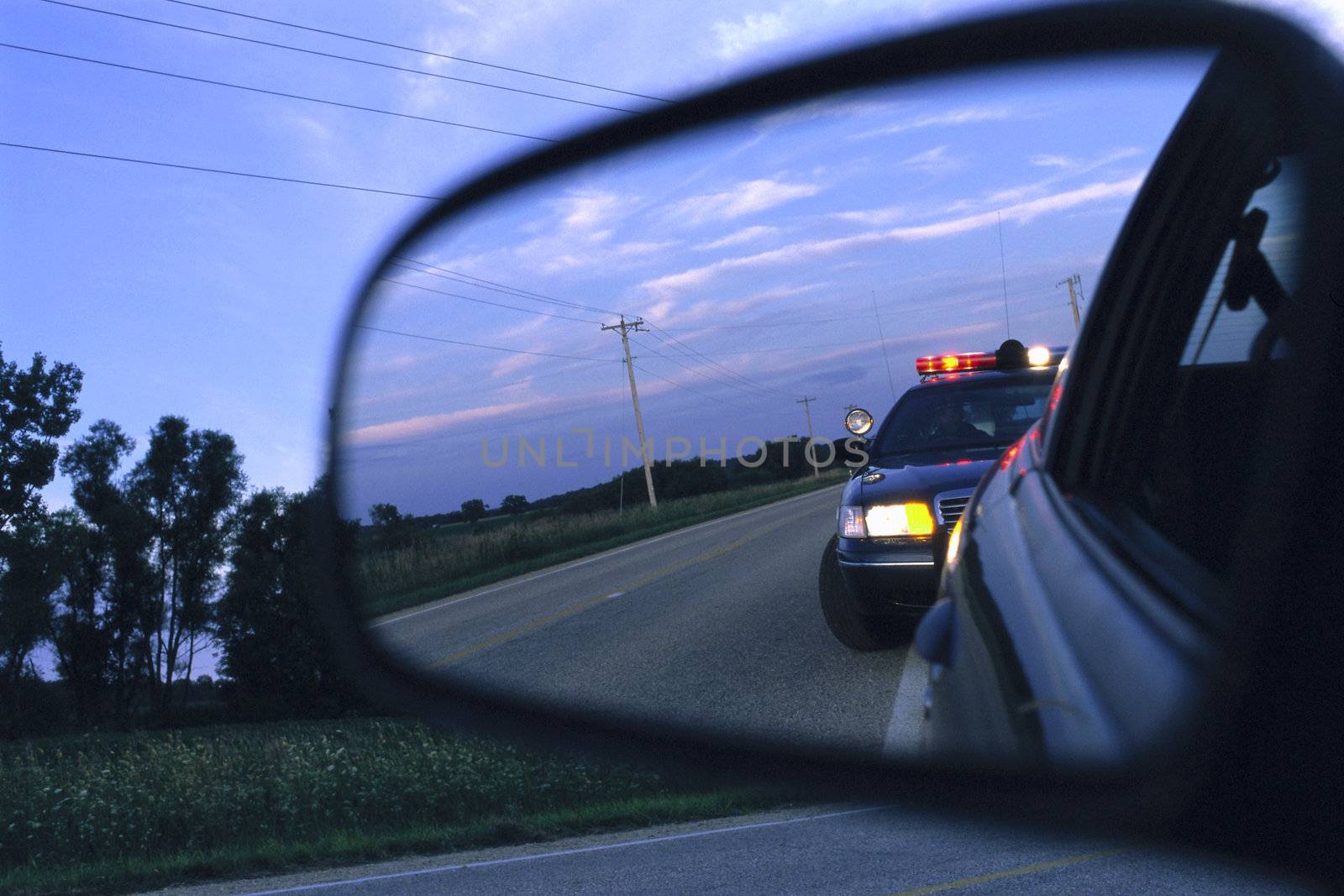 Police Car In Side View Mirror