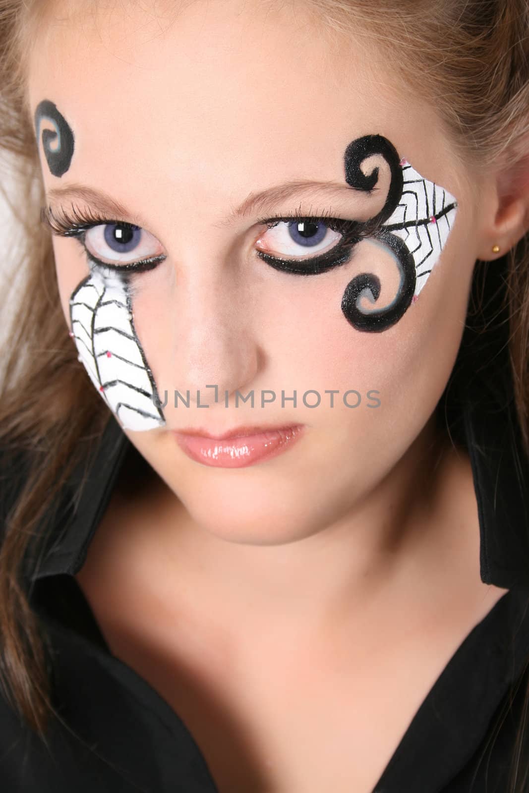 Close-up of Halloween teenager with face paint 