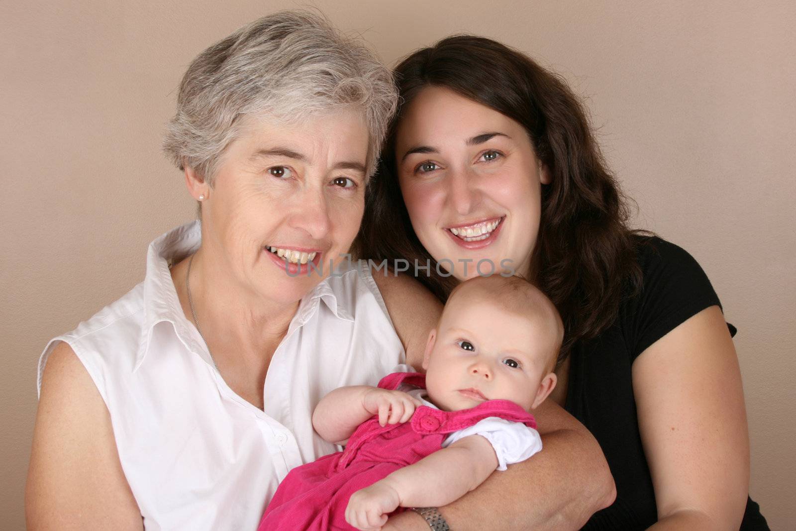 Mother, grandmother and baby girl. Three generations