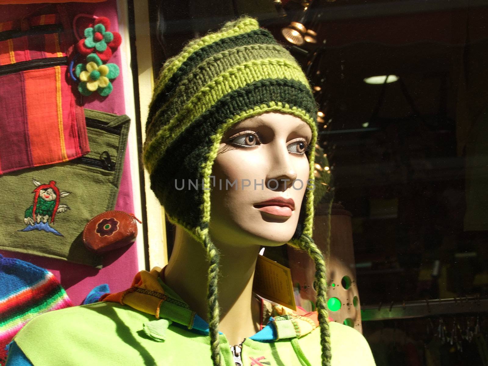 Close-up of a manikin in front of a store