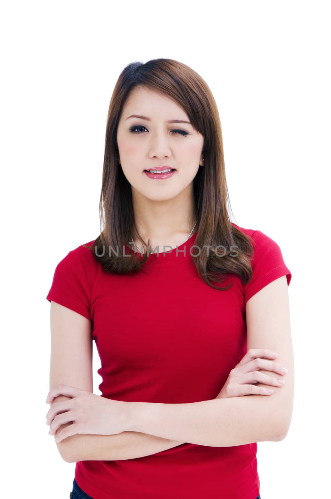 Portrait of an attractive young woman winking, isolated on white background.