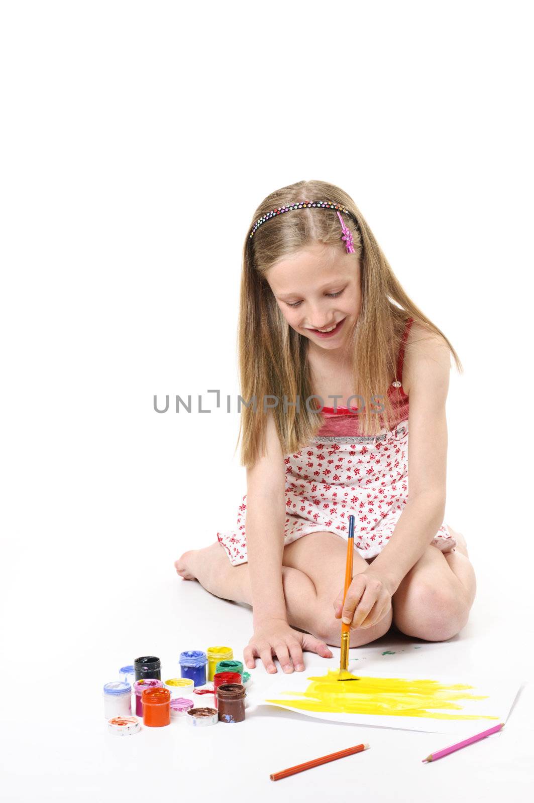 Girl with brush on white background
