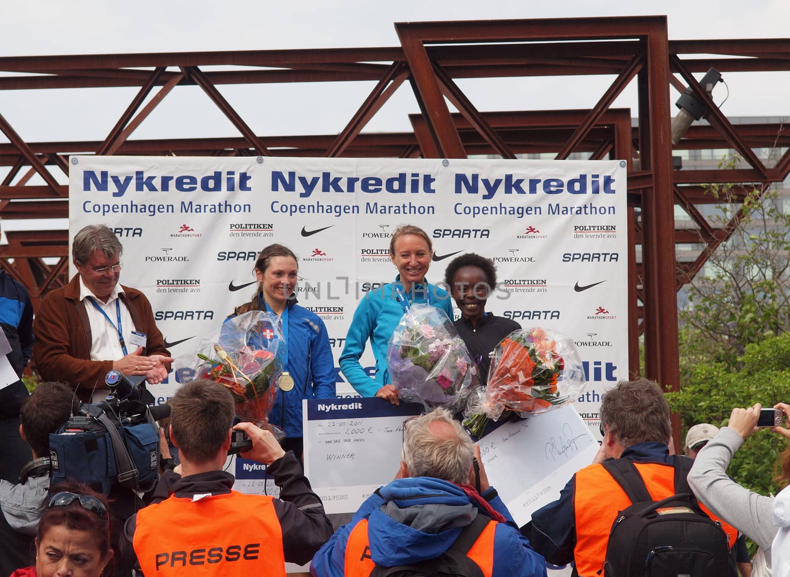 COPENHAGEN - MAY 21: The female winners of the yearly Copenhagen Marathon. First place, Anne-Sofie Hansen - Denmark, second, Tegla Chepkite Loroupe - Kenya, and third place, Mette Bogaard - Denmark.