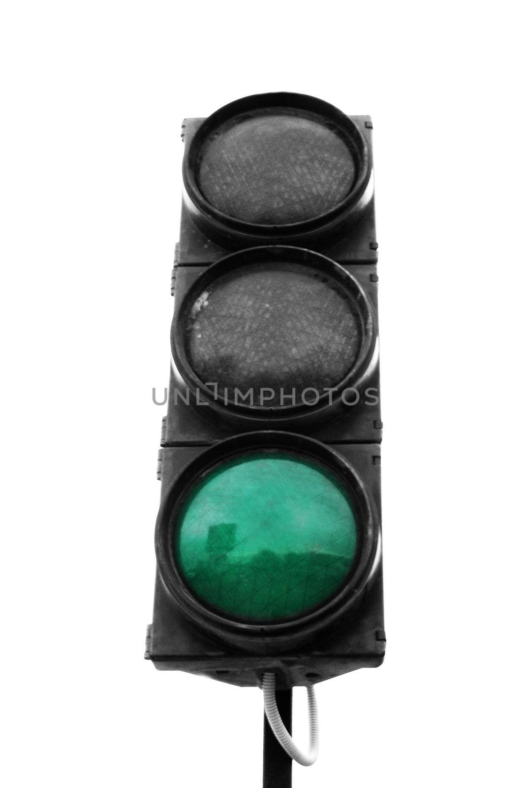 Green traffic light isolated on white background