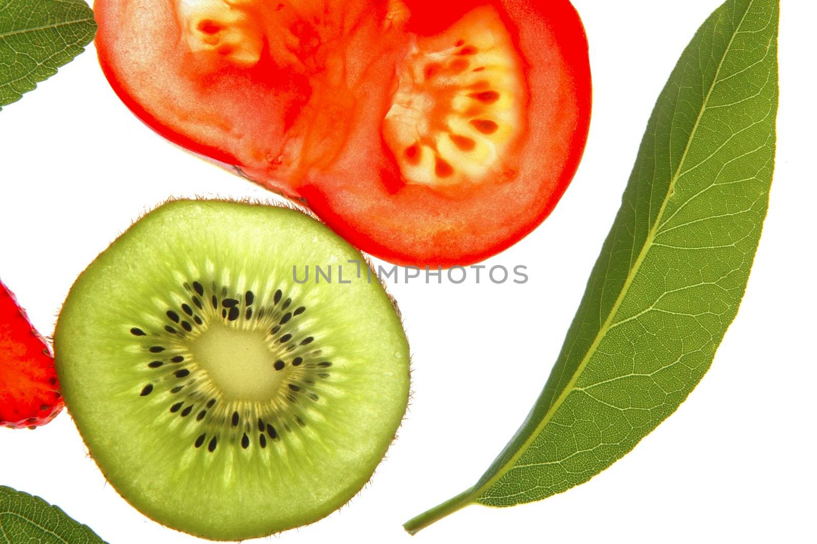 Bay tree leaf, kiwi and tomato transparent slices over white