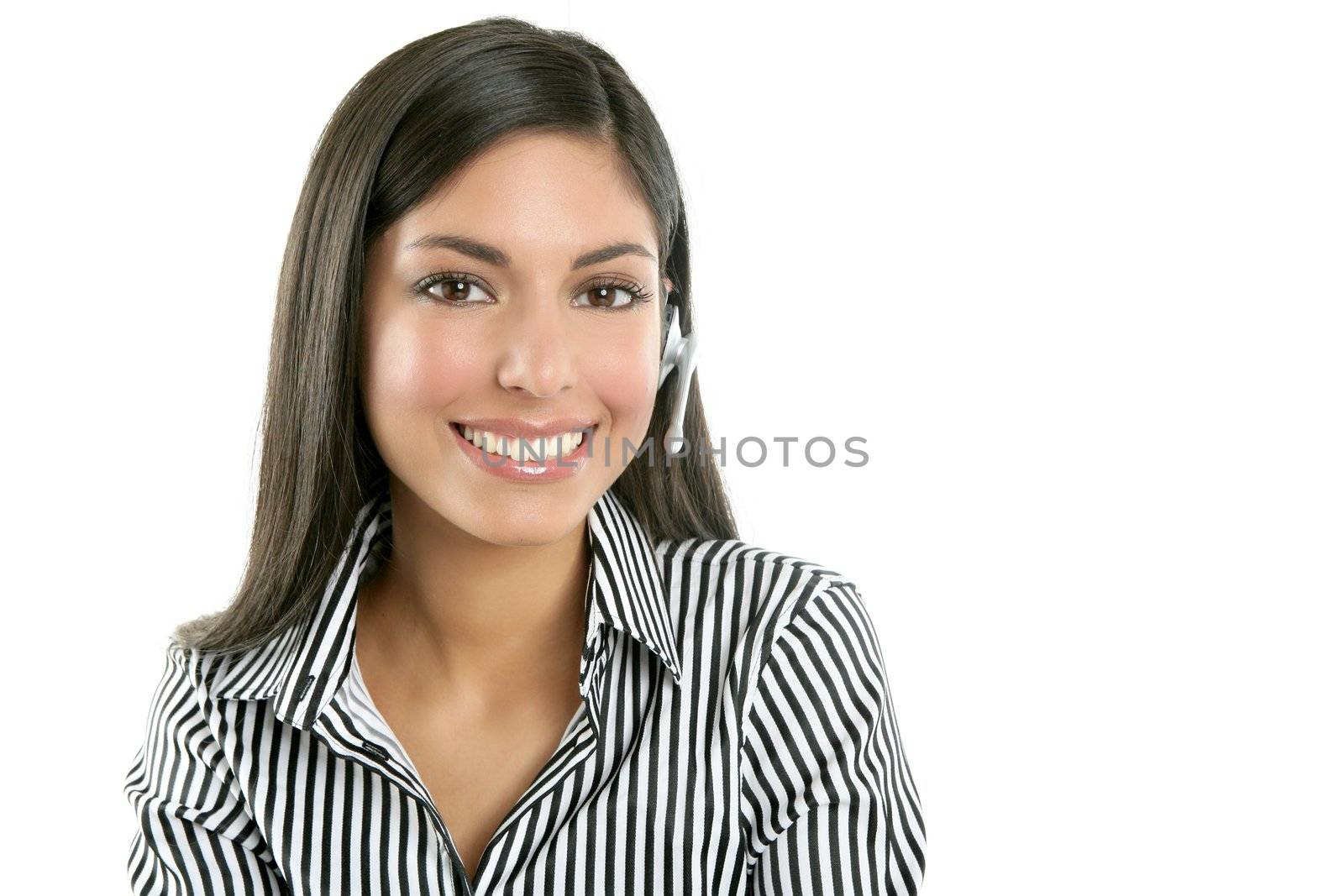 Beautiful young businesswoman talking with headset phone over white background