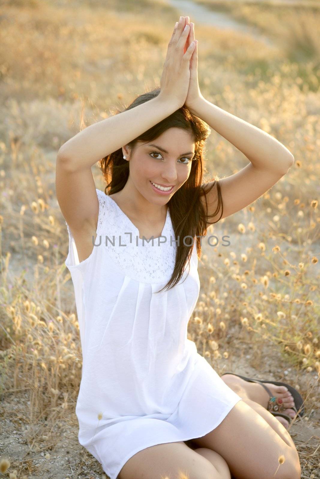 Beautiful indian brunette in a golden field by lunamarina