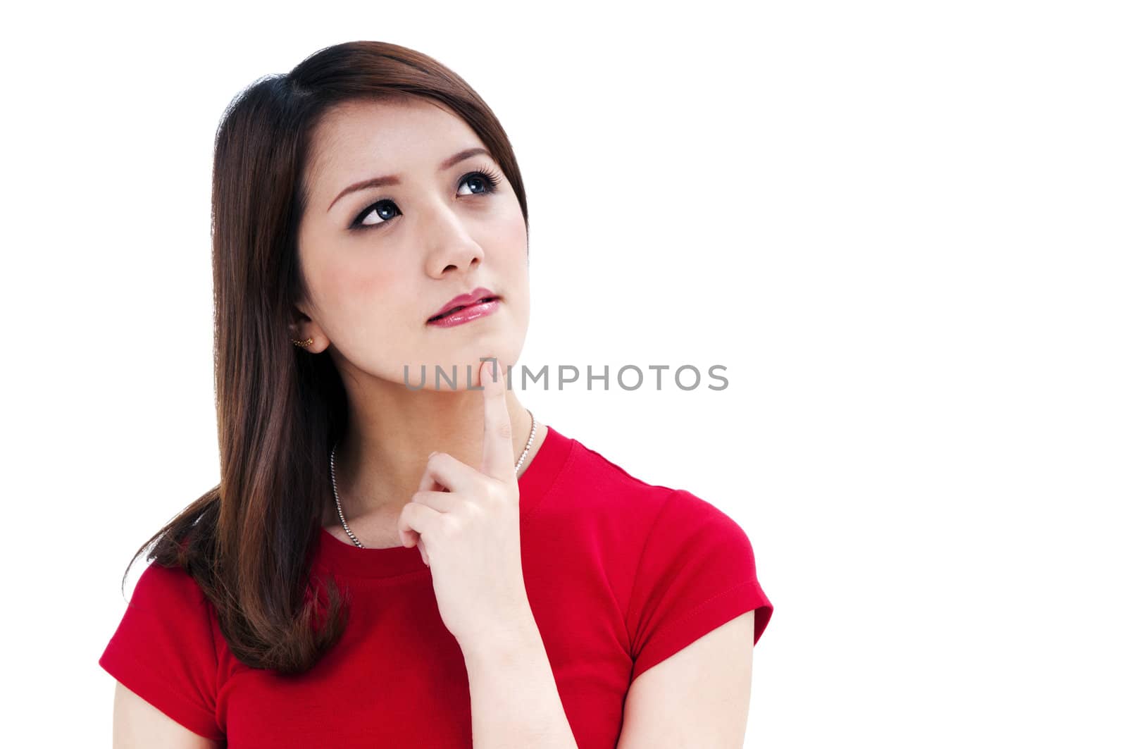 Closeup of an attractive young woman thinking, isolated on white background.