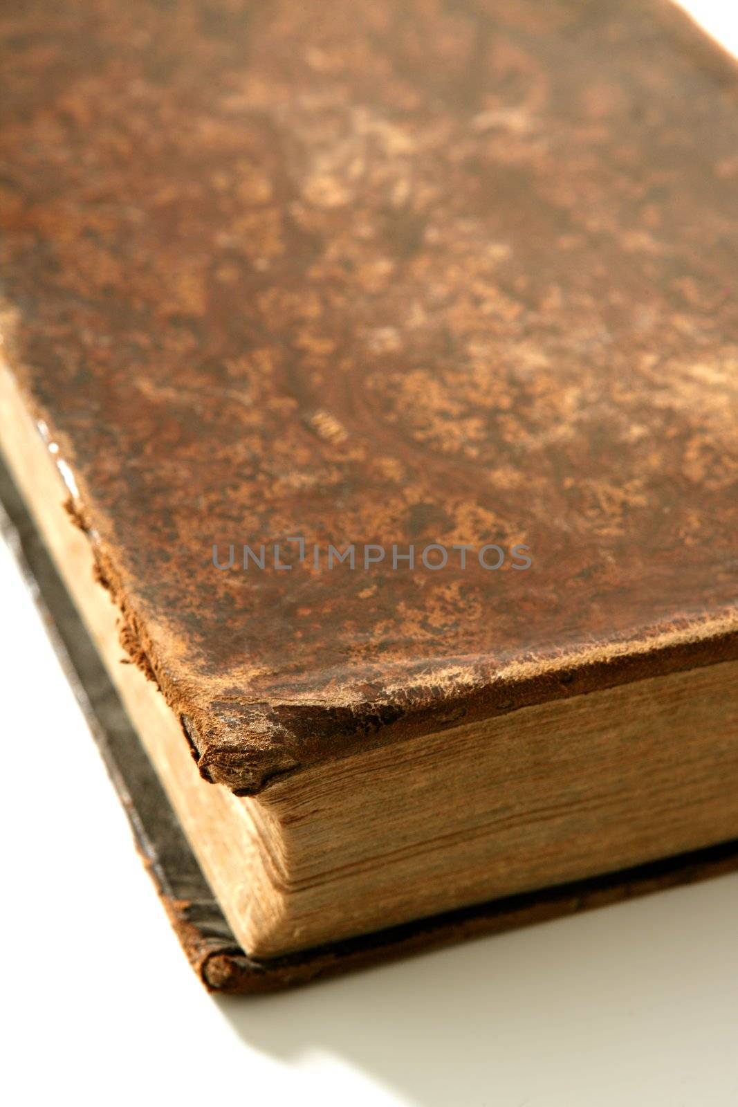 Ancient old aged brown book macro detail