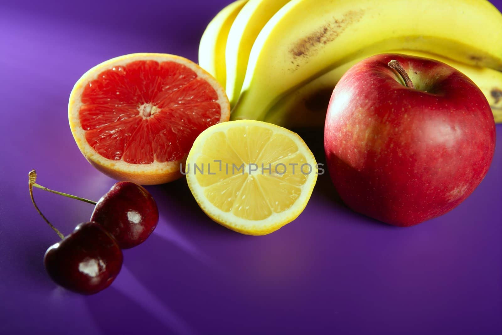 Fruits still life, citrus, cherry, apple, banana