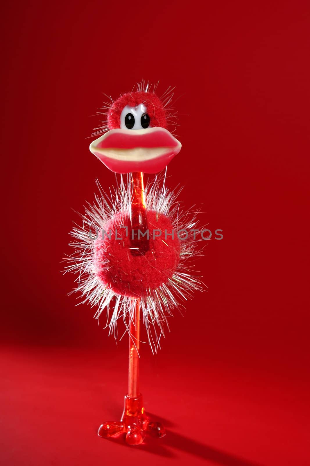 Funny red ostrich toy with big candy hot lips