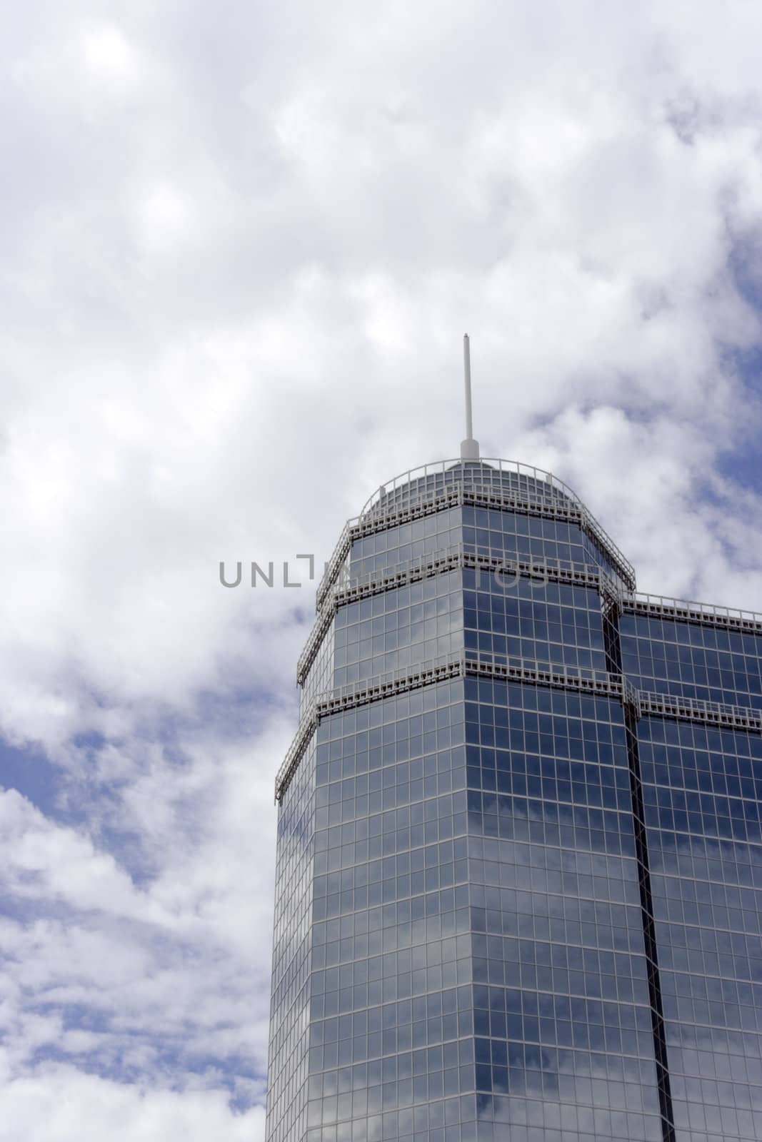 A round architectural glass office building tower