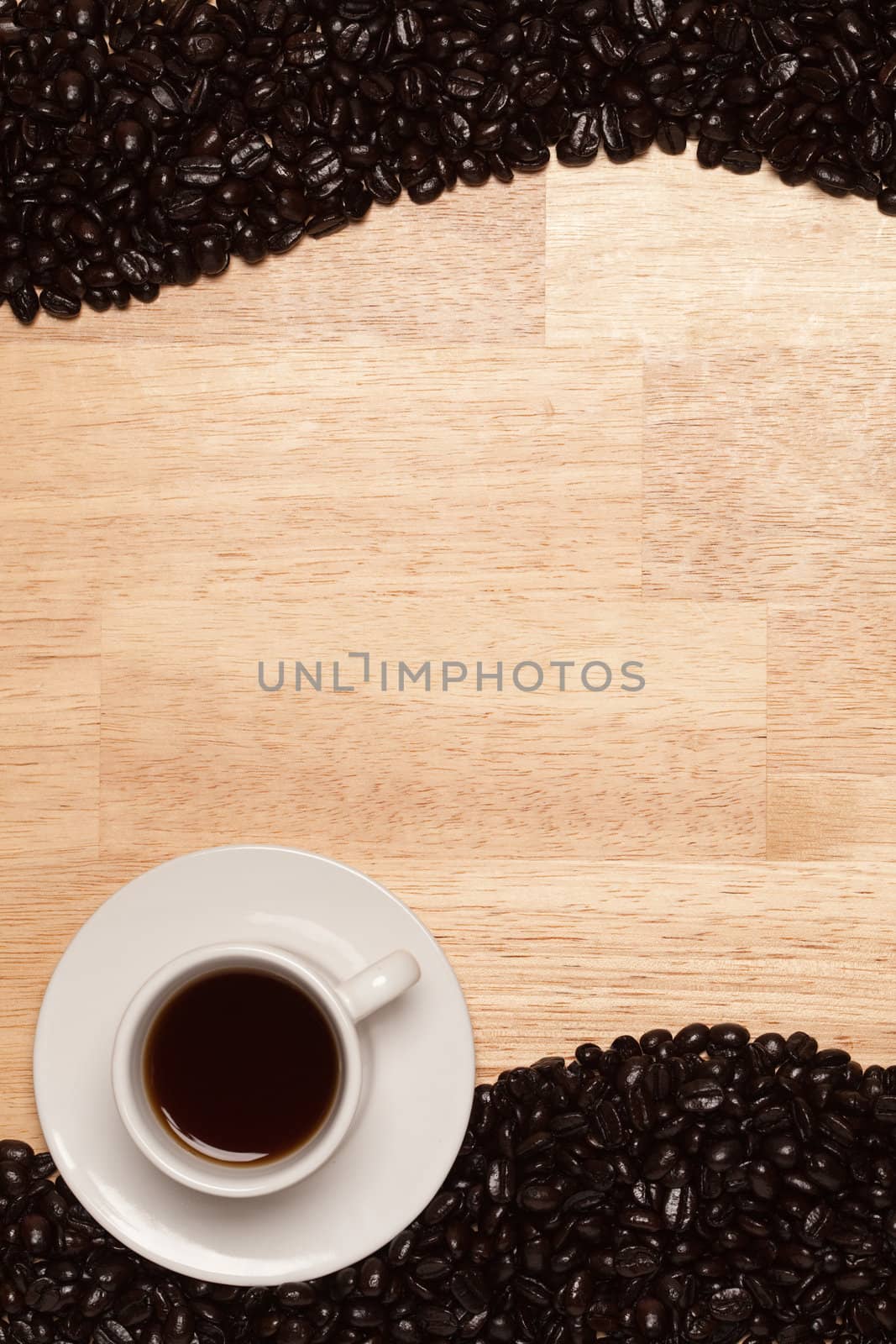 Dark Roasted Coffee Beans on Wood Background by Feverpitched