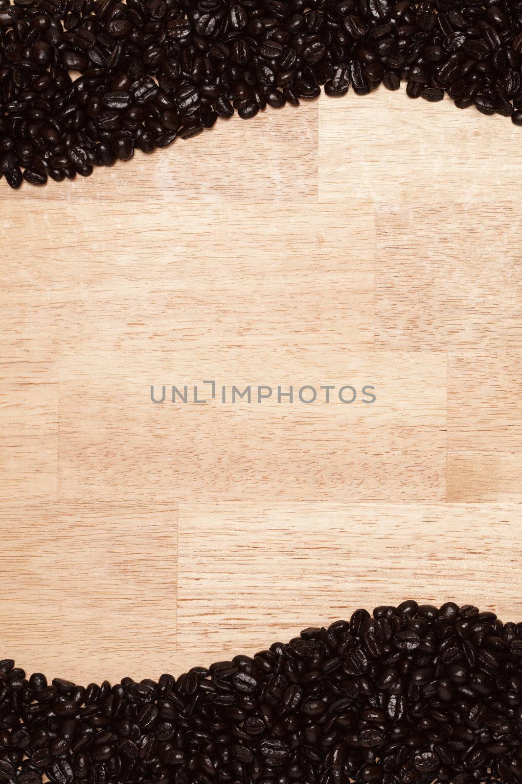 Dark Roasted Coffee Beans on Wood Background by Feverpitched