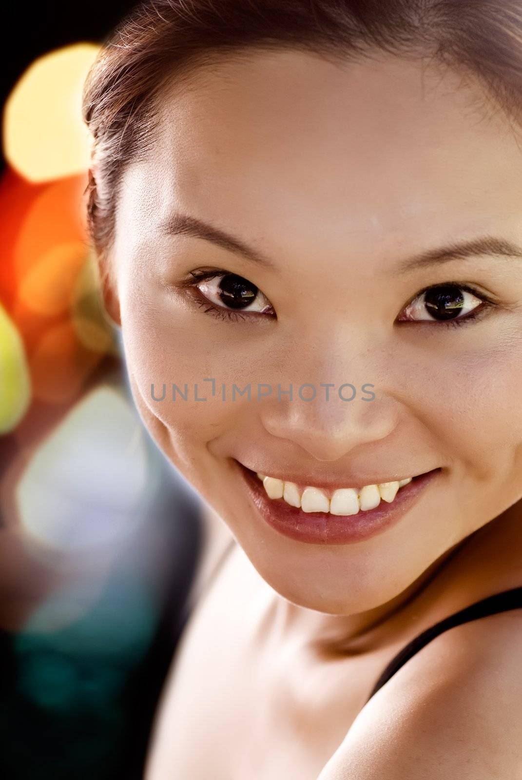 It is a portrait of sexy eastern young lady smiling