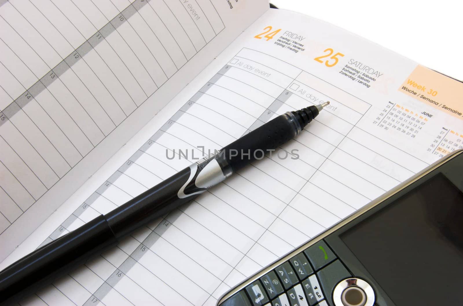 Business Planner with a pen and a smart phone.