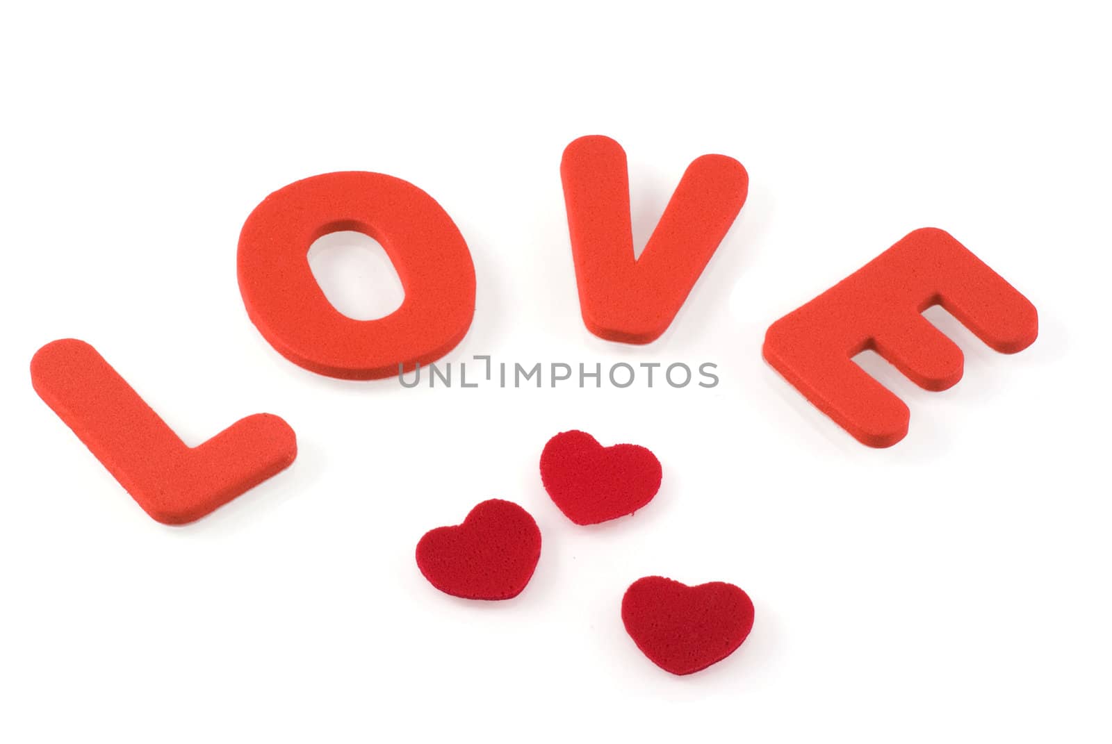 The word love with three red hearts on a white background.