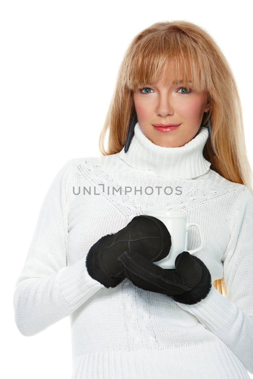 Girl wearing mittens on white isolated background
