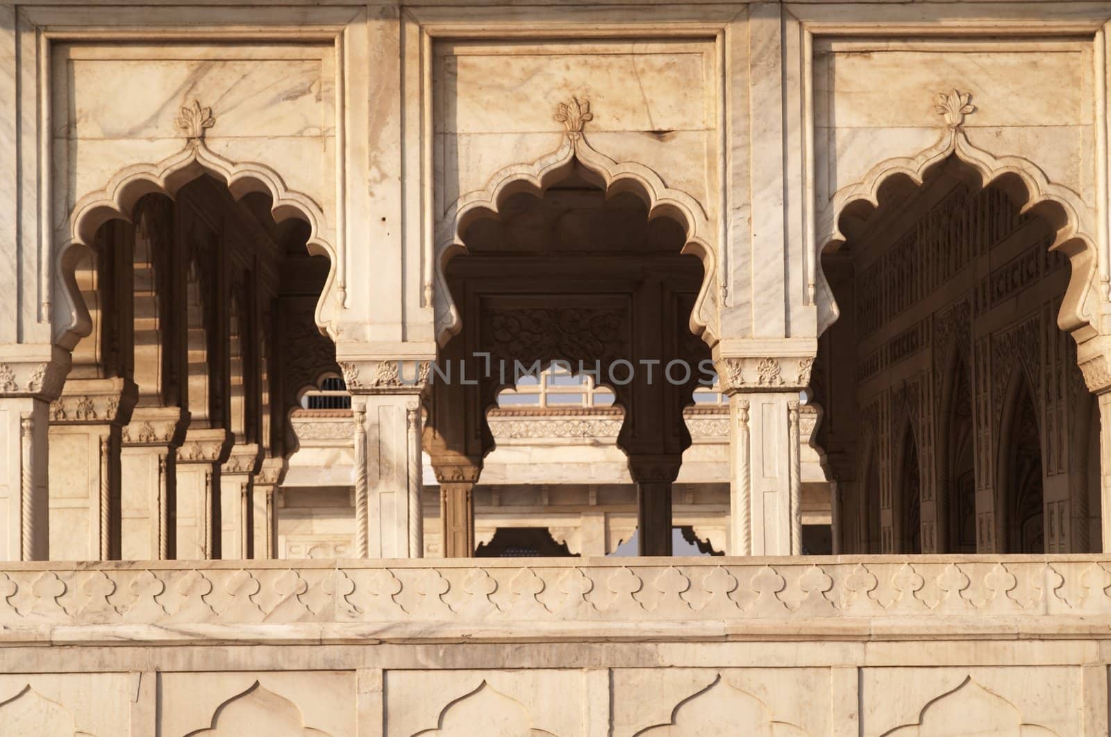 White marble colonnaded arches of the Diwan - i-Aam (Public Audience Chamber) inside the Red Fort in Agra, India