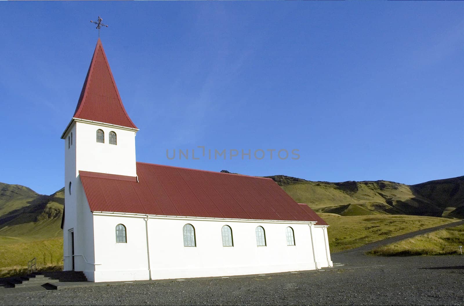 Church against mountain at V�k, Iceland