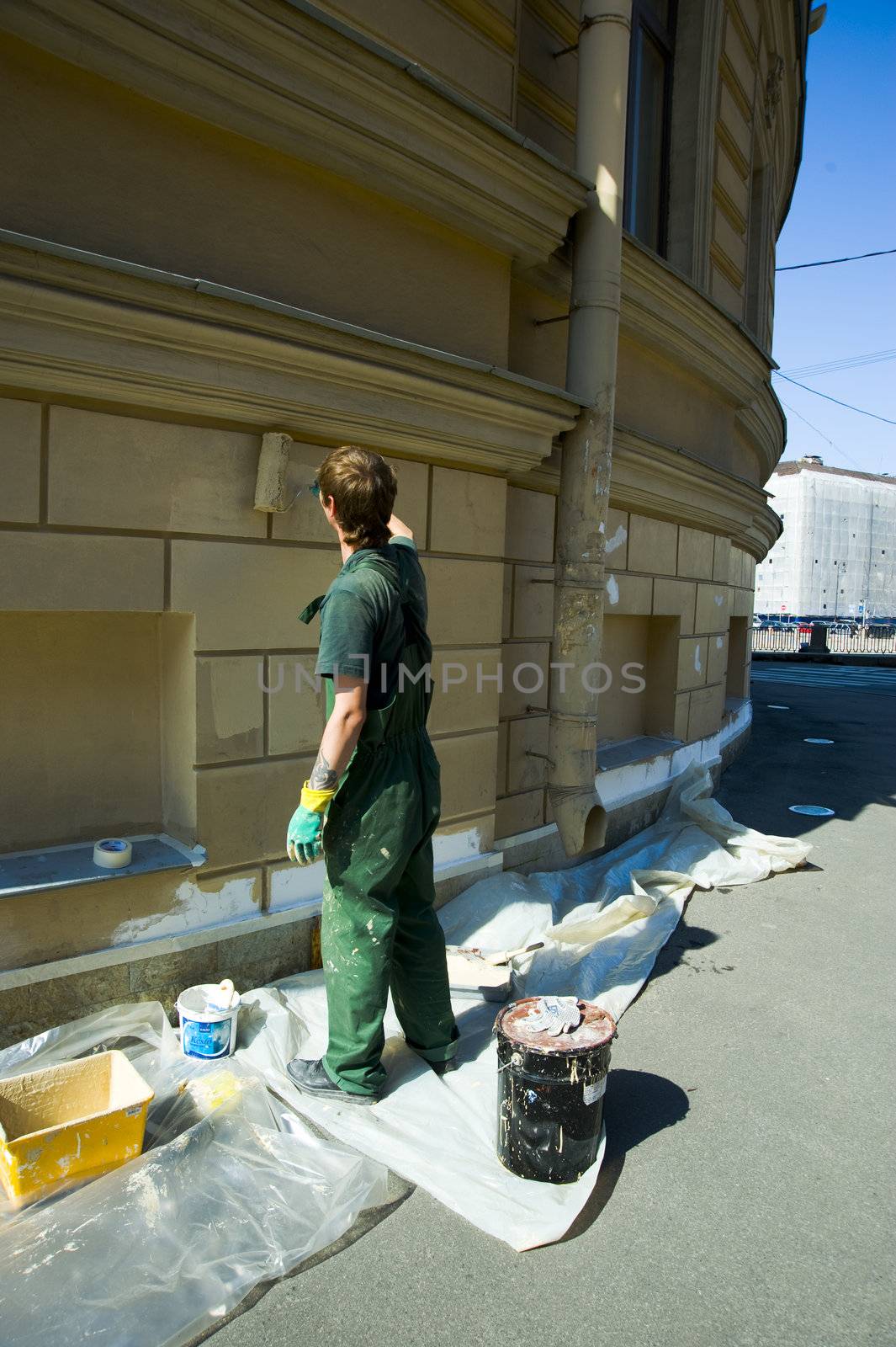 Man paint the wall taken in Sankt Petersburg Russia