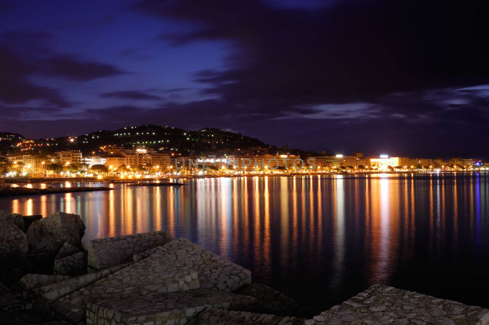 The city of Cannes, France, at night by akarelias