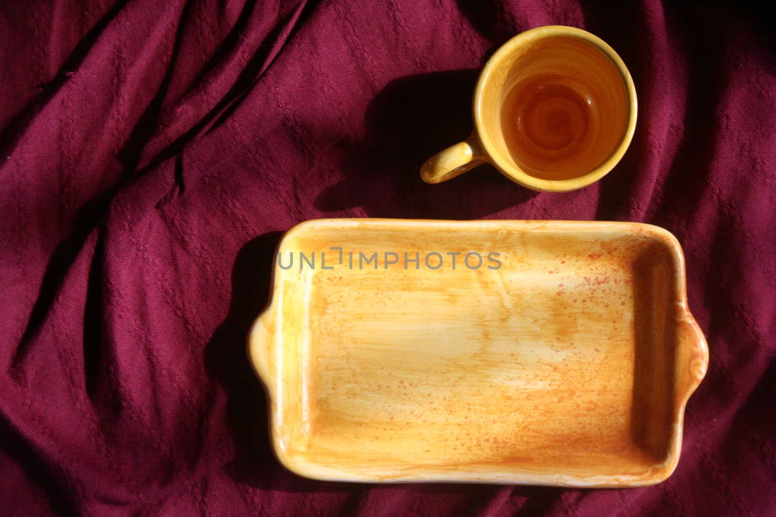 Yellow cup of expresso on purple background