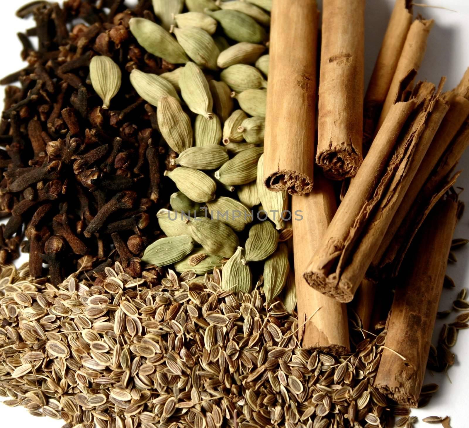 Cinnamon, cloves, cardamom, seeds