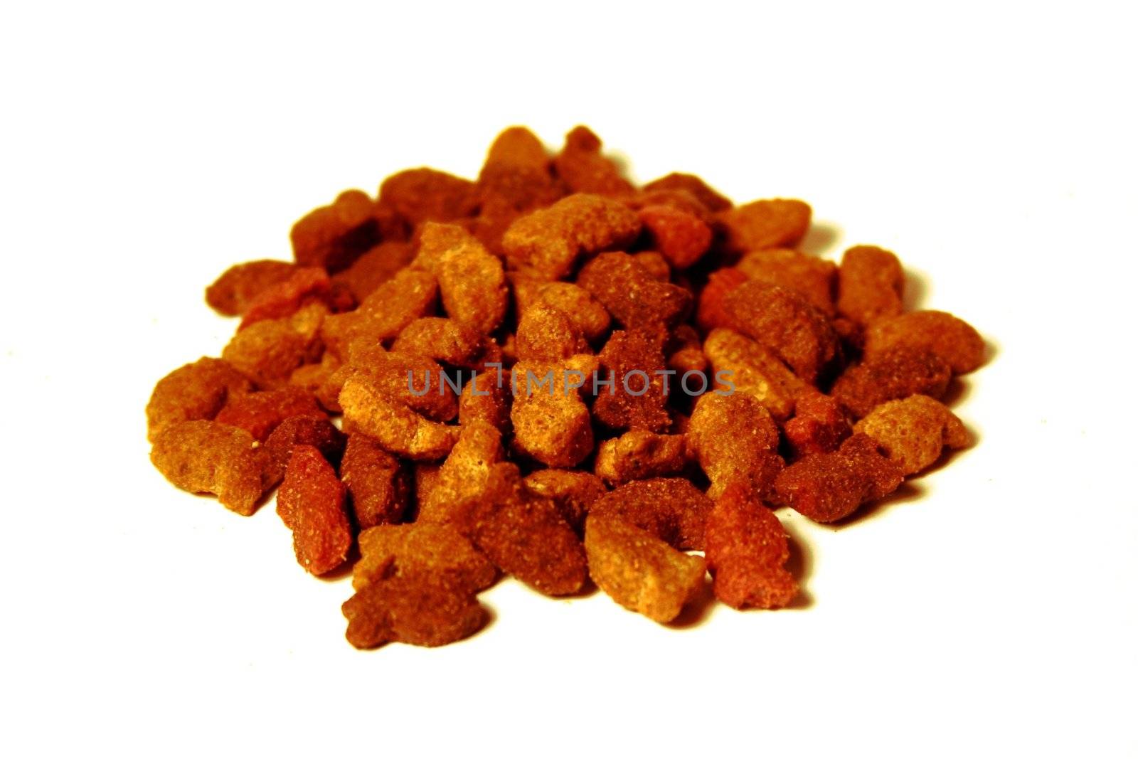Grounded cat food on white background
