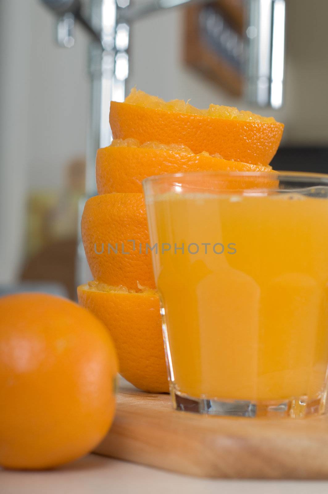 Shot of glass orang juice on the tabletop