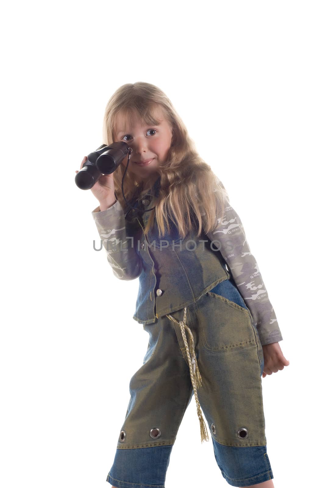 Shot of little girl with binoculars in studio